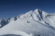 la cima, alle spalle Monte Bianco e Grande Rochere