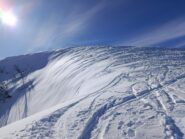 Parte finale con accumulo e neve ventata 