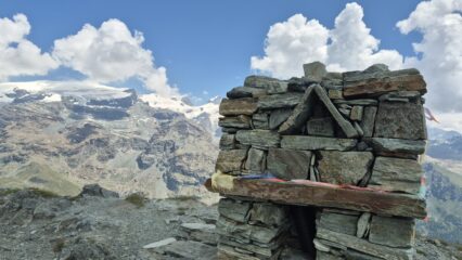 in cima